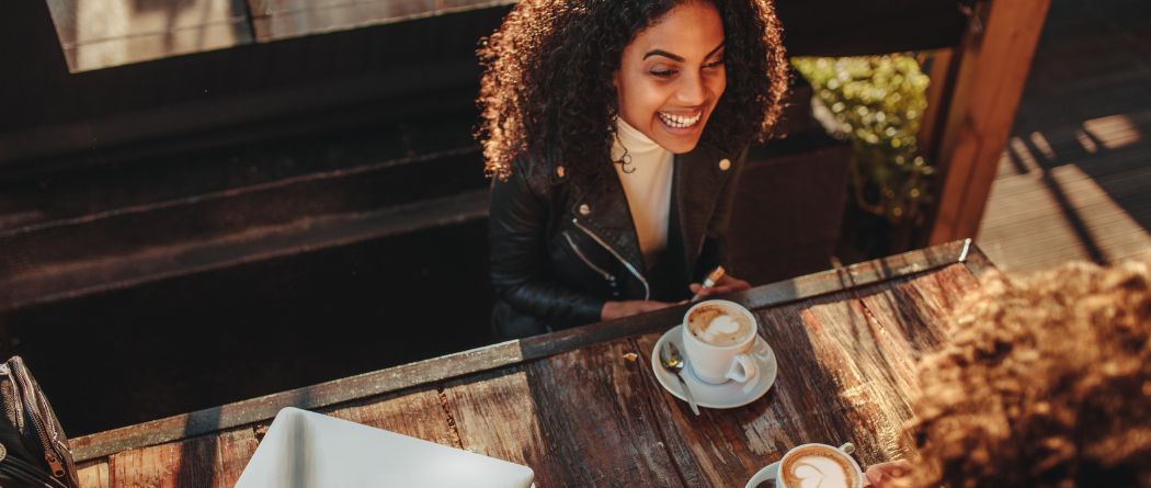 woman having coffee with friend