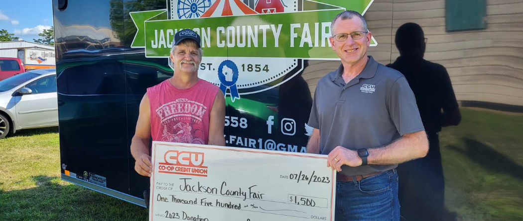 CCU presenting check at county fair