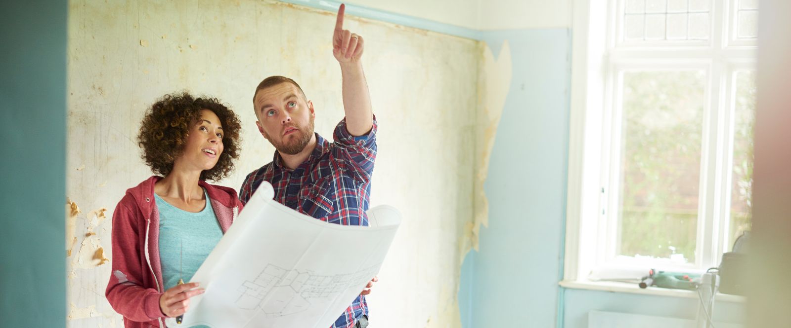 people planning house construction